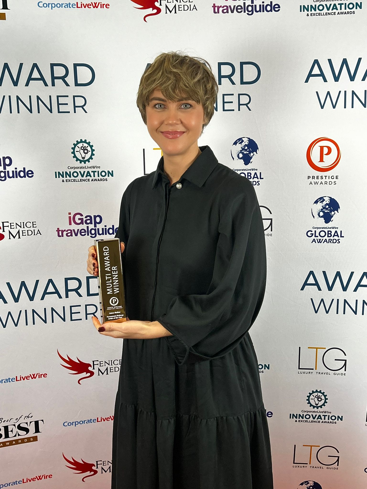 Helen Walker with her Multi-Award Winner trophy at the Innovation & Excellence Awards